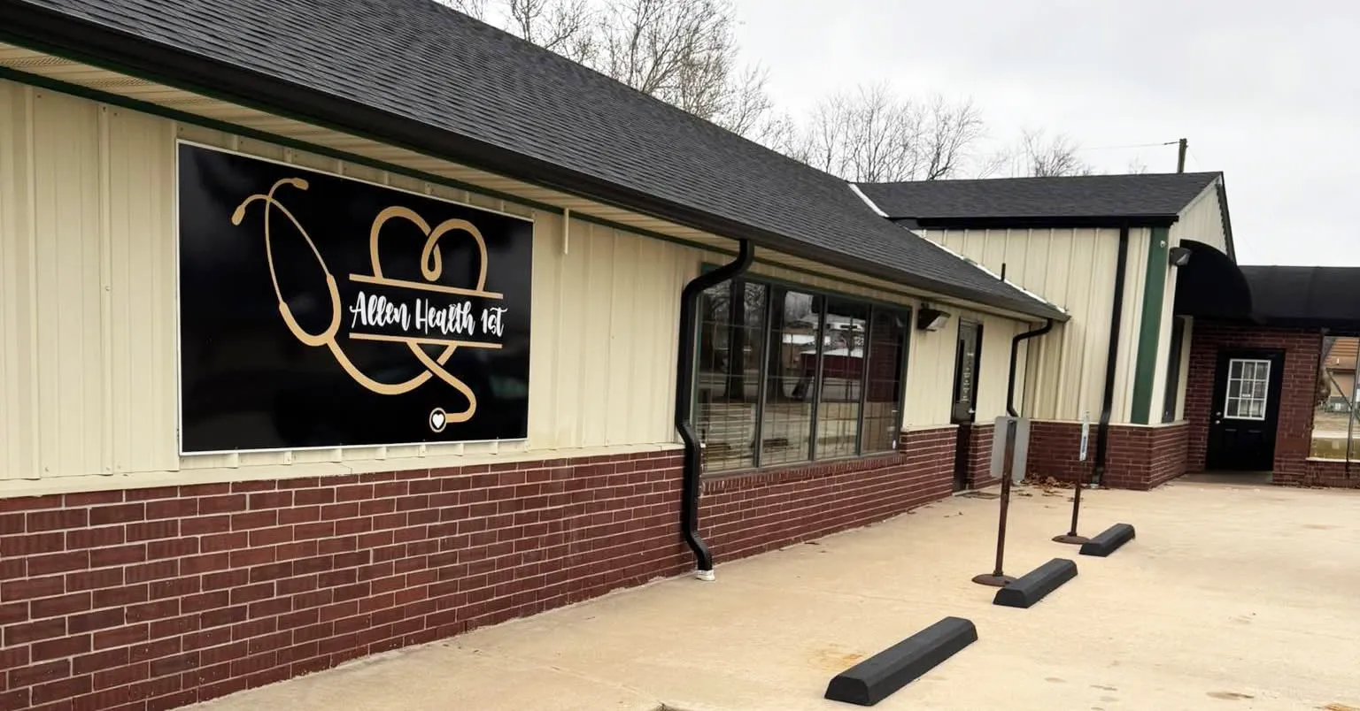 Exterior of a primary care clinic with brick and siding.
